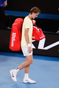 MELBOURNE, AUSTRALIA - JANUARY 24: Sebastian Korda leaves the court injured after retiring against Karen Khachanov of Russia in quarter final action on day 9 of the 2023 Australian Open at Melbourne Park on January 24, 2023 in Melbourne, Australia.