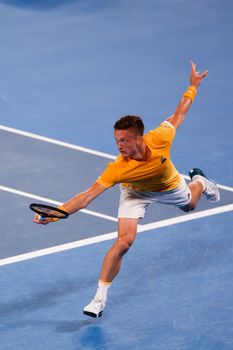 MELBOURNE, AUSTRALIA - JANUARY 24: Jiri Lehecka of Czech Republic plays Stefanos Tsitsipas of Greece in quarter final action on day 9 of the 2023 Australian Open at Melbourne Park on January 24, 2023 in Melbourne, Australia.