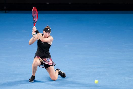 MELBOURNE, AUSTRALIA - JANUARY 24: Elena Rybakina of Russia plays Jelena Ostapenko of Latvia in quarter finals action on day 9 of the 2023 Australian Open at Melbourne Park on January 24, 2023 in Melbourne, Australia.