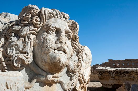 rchaeological site of Leptis Magna, Libya - 10/30/2006:  The head of Medusa in the Forum of Severe in the ancient Roman city of Leptis Magna