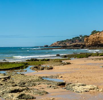 Maria Luisa beach with rock formation in Albufeira, Algarve, Portugal.