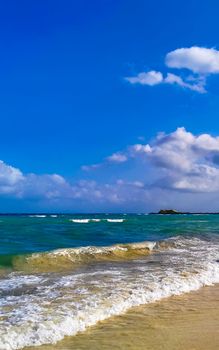 Tropical caribbean beach landscape panorama with clear turquoise blue water in Playa del Carmen Mexico.