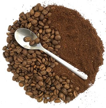 Coffee beans, ground coffee and a spoon. The photo shows coffee beans, ground coffee in the shape of a circle on a white background and a spoon.