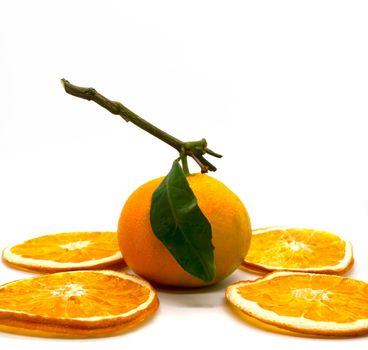 Tangerine and orange slices close-up. Tangerine and orange slices on a white background.