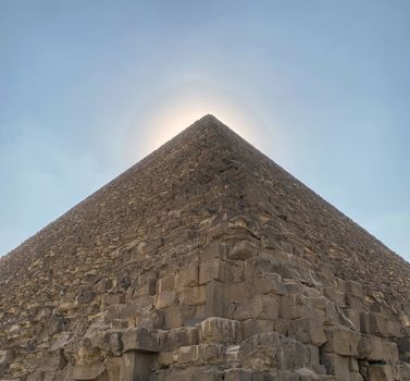 Egyptian pyramid. Pictured is an Egyptian pyramid against a blue sky.