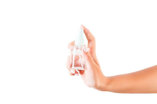 Female hand holding cream bottle of lotion isolated. Girl give tube cosmetic products on white background.