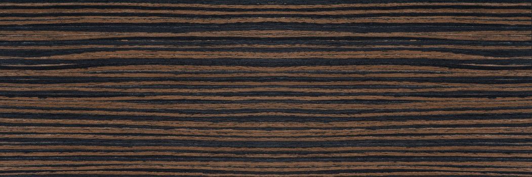 Dark ebony background, exclusive natural ebony texture with black and brown texture. Photo of natural wood veneer in high resolution