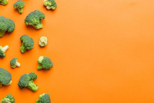 Broccoli scattered on white wooden table.copy space.Top view