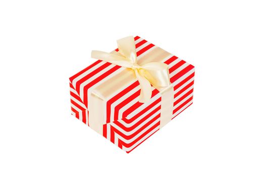 Christmas or other holiday handmade present in red paper with gold ribbon. Isolated on white background, top view. thanksgiving Gift box concept.