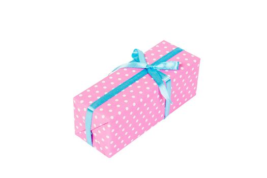 Christmas or other holiday handmade present in pink paper with blue ribbon. Isolated on white background, top view. thanksgiving Gift box concept.