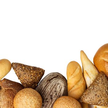 Composition with loafs of bread isolated on white background.