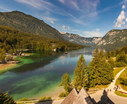View of scenic Bohinj lake, the largest permanent lake in Slovenia, located within the Bohinj Valley of the Julian Alps