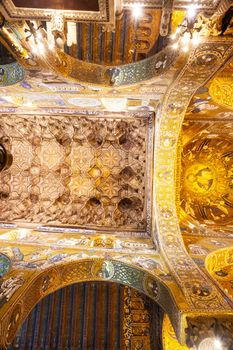 Shining ceiling of the Palatine Chapel. Royal chapel of the Norman palace in Palermo, mixture of Byzantine, Norman and Fatimid architectural styles.