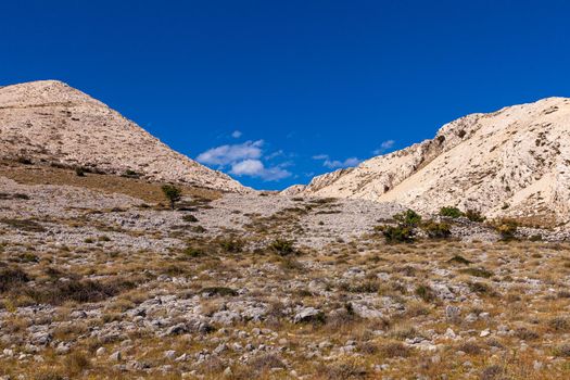 View of bare hills in Stara Baska, Krk island in Croatia
