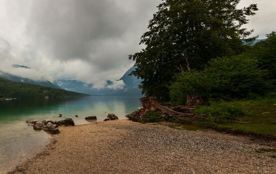 View of scenic Bohinj lake, the largest permanent lake in Slovenia, located within the Bohinj Valley of the Julian Alps