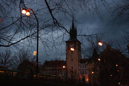 View of the bell tower of the Prague church in the evening, Czech Republic