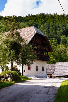 View of Slovenian chalet in Stara Fuzina little town near Bohinj, Slovenia