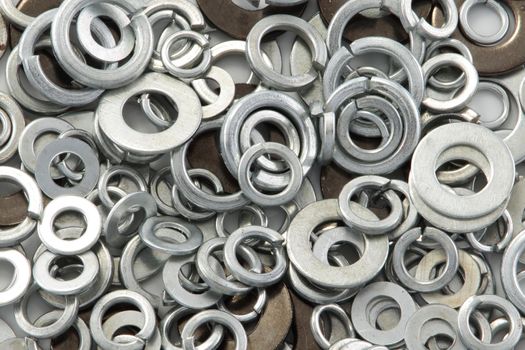 A pile of washers of different sizes background image