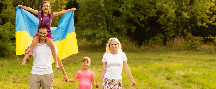 family with the flag of ukraine.