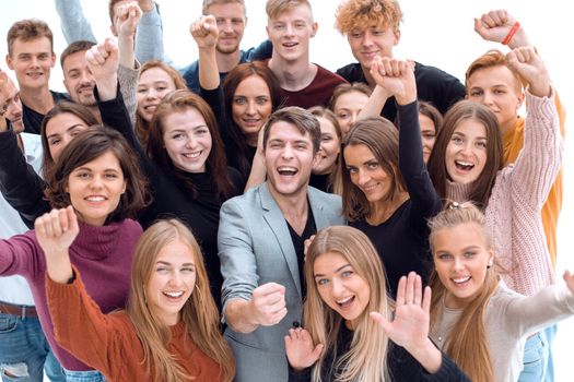 close up. group of happy young people showing their success