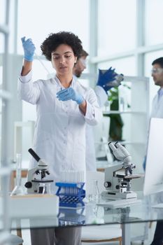 Scientists smiling together in lab