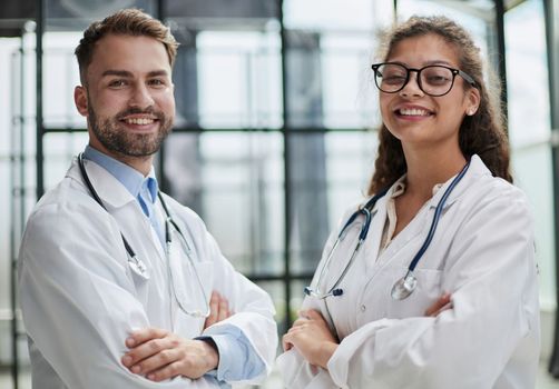 portrait of two medical workers in the hospital looking at the camera