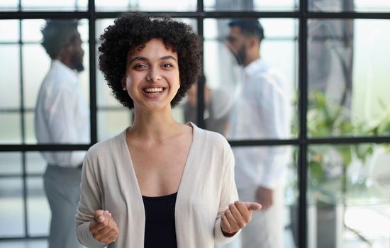 Portrait of a young business woman in an modern office