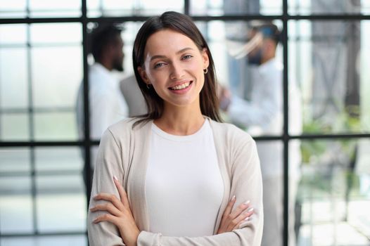 Portrait of a young business woman in an modern office