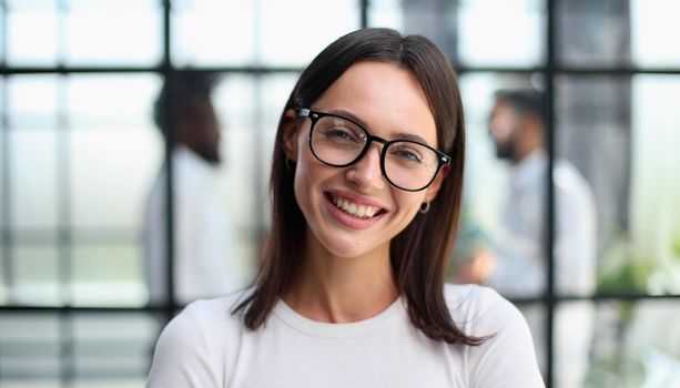 Portrait of a young business woman in an modern office