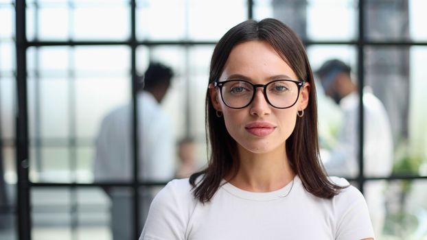 Portrait of a young business woman in an modern office