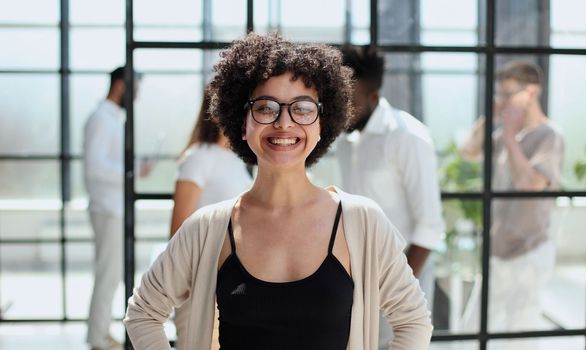 Portrait of a young business woman in an modern office