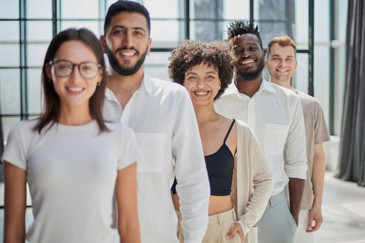 Face of beautiful woman on the background of business people