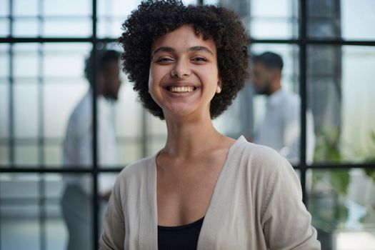 Portrait of a young business woman in an modern office