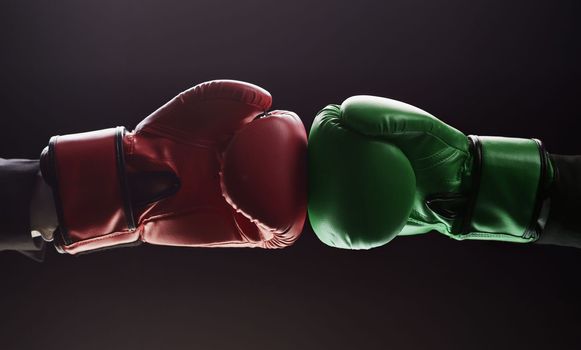 Two men's hands in boxing gloves. Confrontation concept