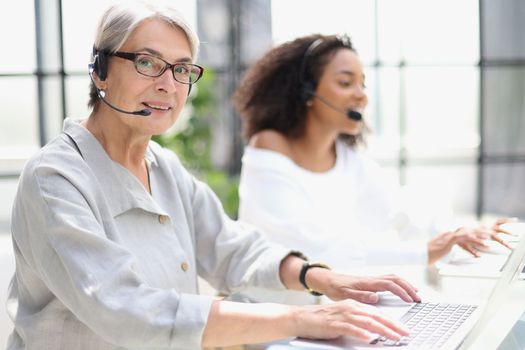 operator woman agent with headsets working in a call centre