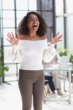 Portrait of a young attractive African American woman in the office