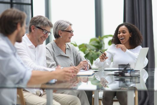 Conversation between managers and employees in the office
