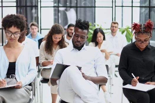 Group of multi-ethnic business people in a seminar