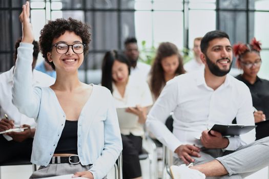people sitting in business seminar room in hotel business