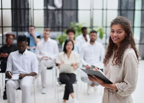 Business people attending a seminar with social distancing