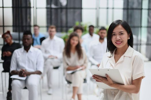 Business people attending a seminar with social distancing