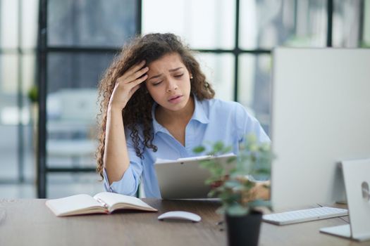 Business woman with documents in the modern office. business concept