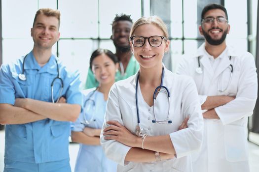 Group of specialists in white overalls at advanced training courses