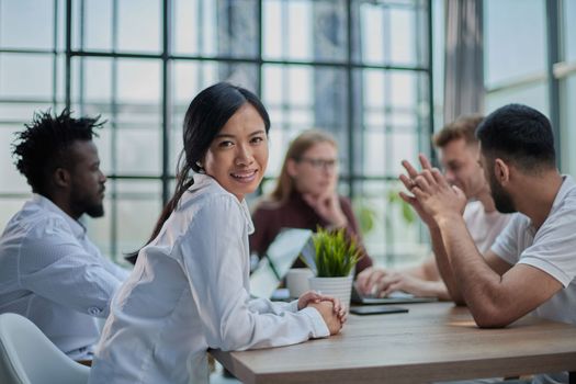 Multi-ethnic group of architects in a meeting