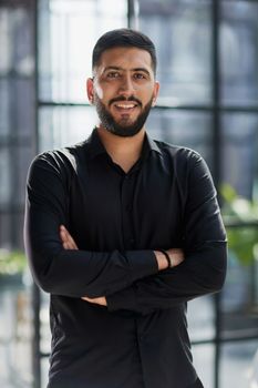 portrait of a young businessman who is smiling