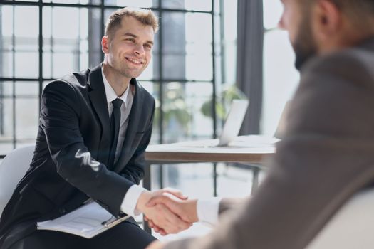 Business handshake and business people