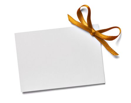 close up of a note card with ribbon bow on white background