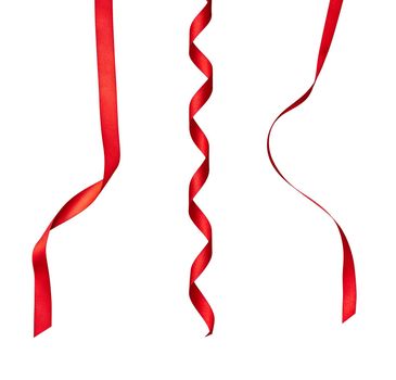 collection of various red ribbon pieces on white background. each one is shot separately