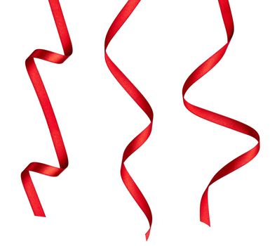 collection of various red ribbon pieces on white background. each one is shot separately