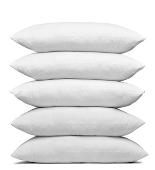 close up of a white pillow on white background